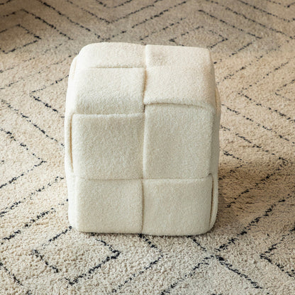 Casa Verve Furniture cream boucle cube ottoman with tufted finish, used as a footrest on a geometric rug.