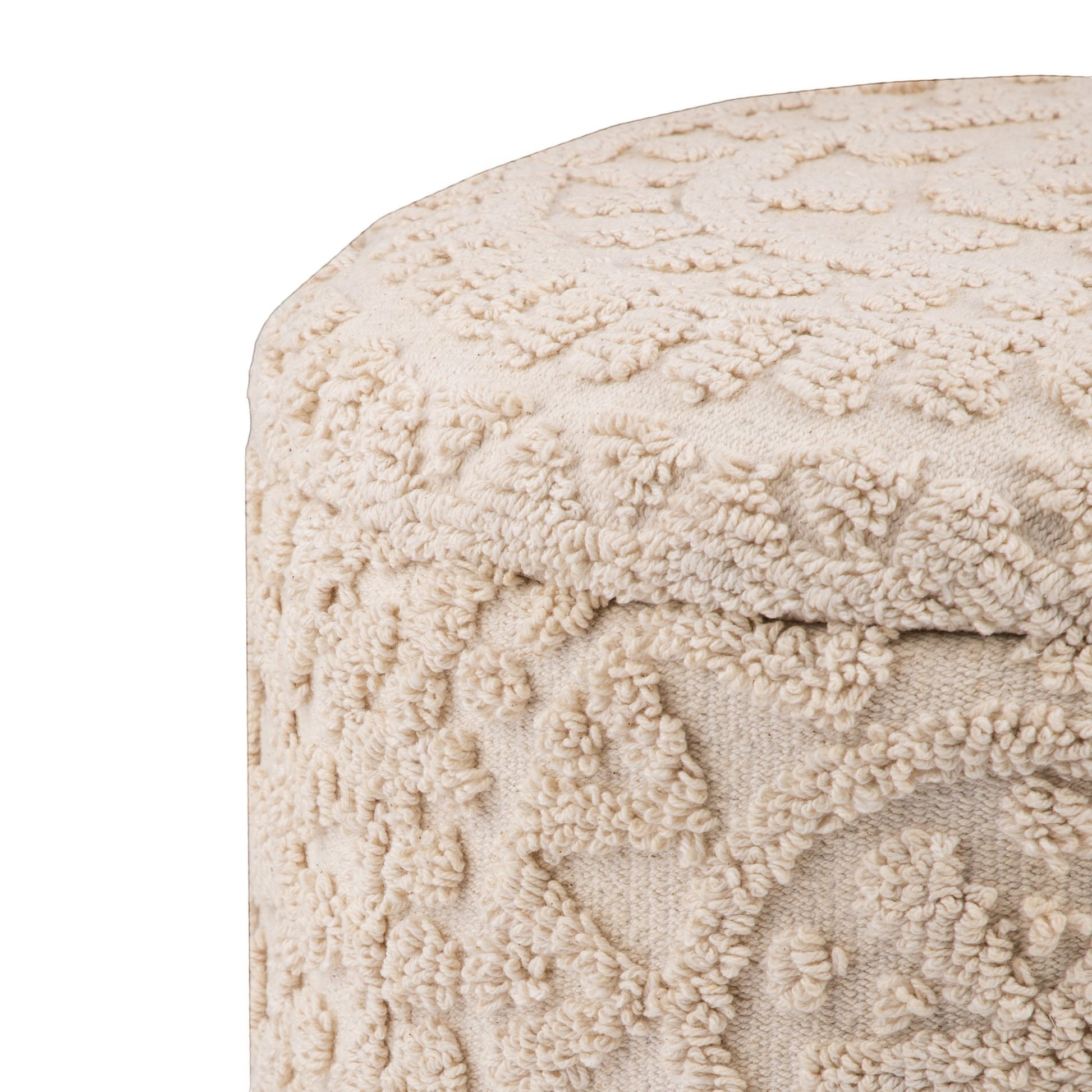 Casa Verve Furniture cream textured round bohemian ottoman with raised floral patterns, perfect as a footrest or accent seating.