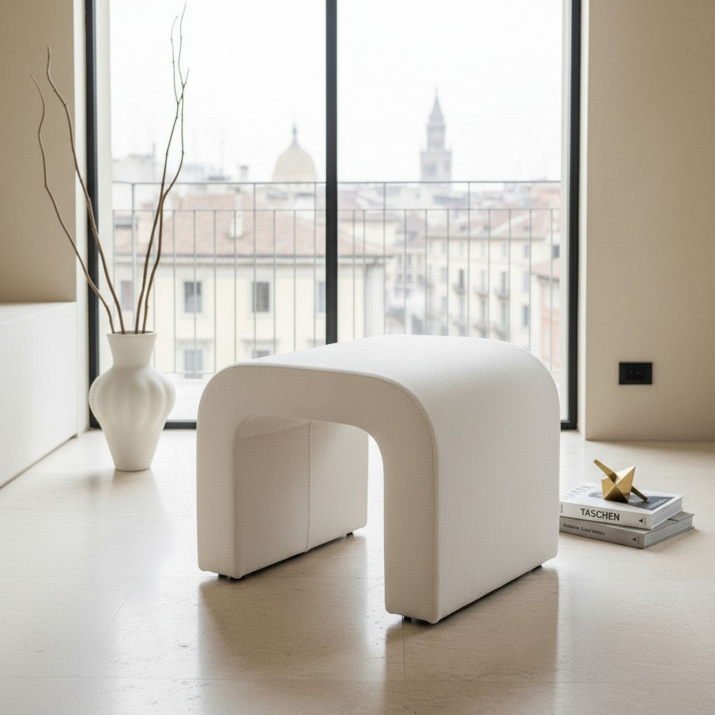 Casa Verve Furniture white polyester arch ottoman with a modern, sculptural design, perfect as a footrest or accent stool.
