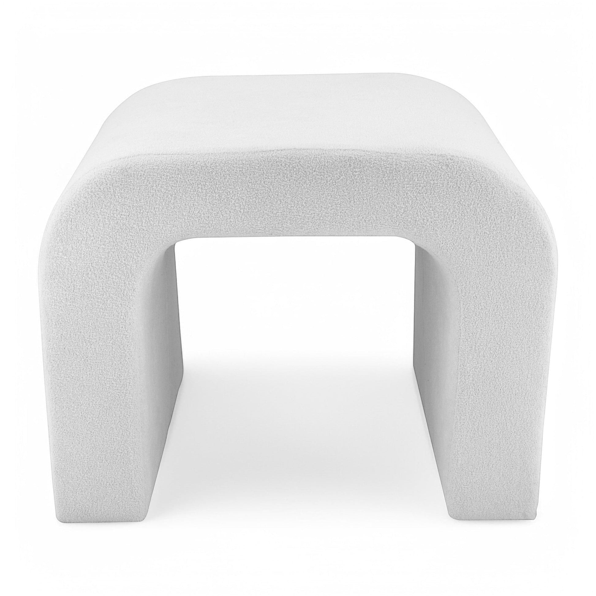 Casa Verve Furniture white ultra-soft polyester arch ottoman with a modern, sculptural design.