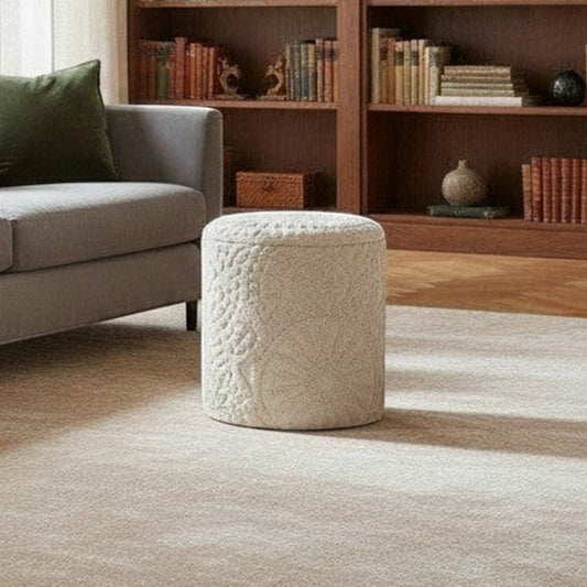 Casaverve Bohemian Textured Round Ottoman in cream, styled beside a grey sofa in a living room
