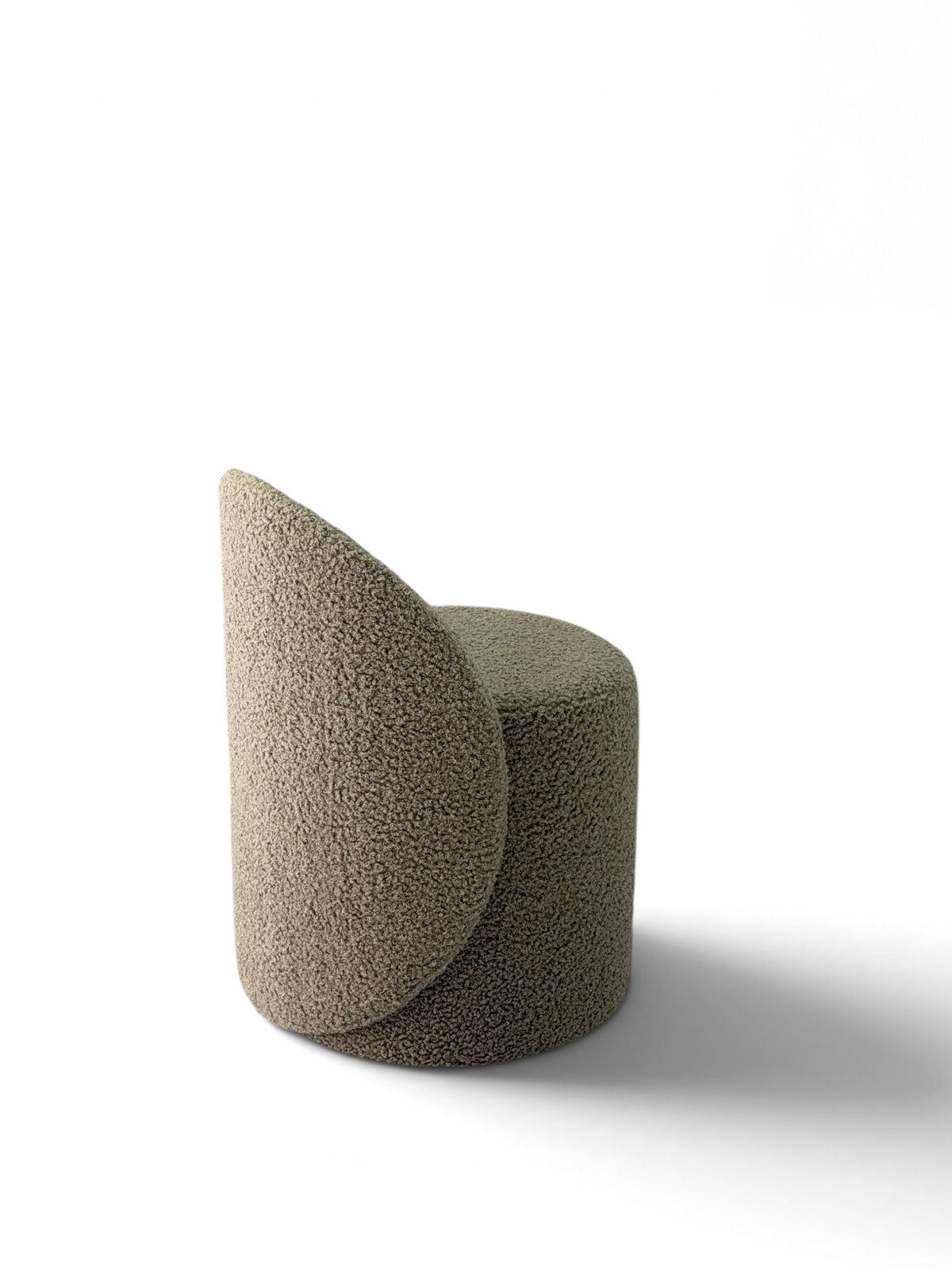 Prisma bouclé accent chair in beige on a white background
