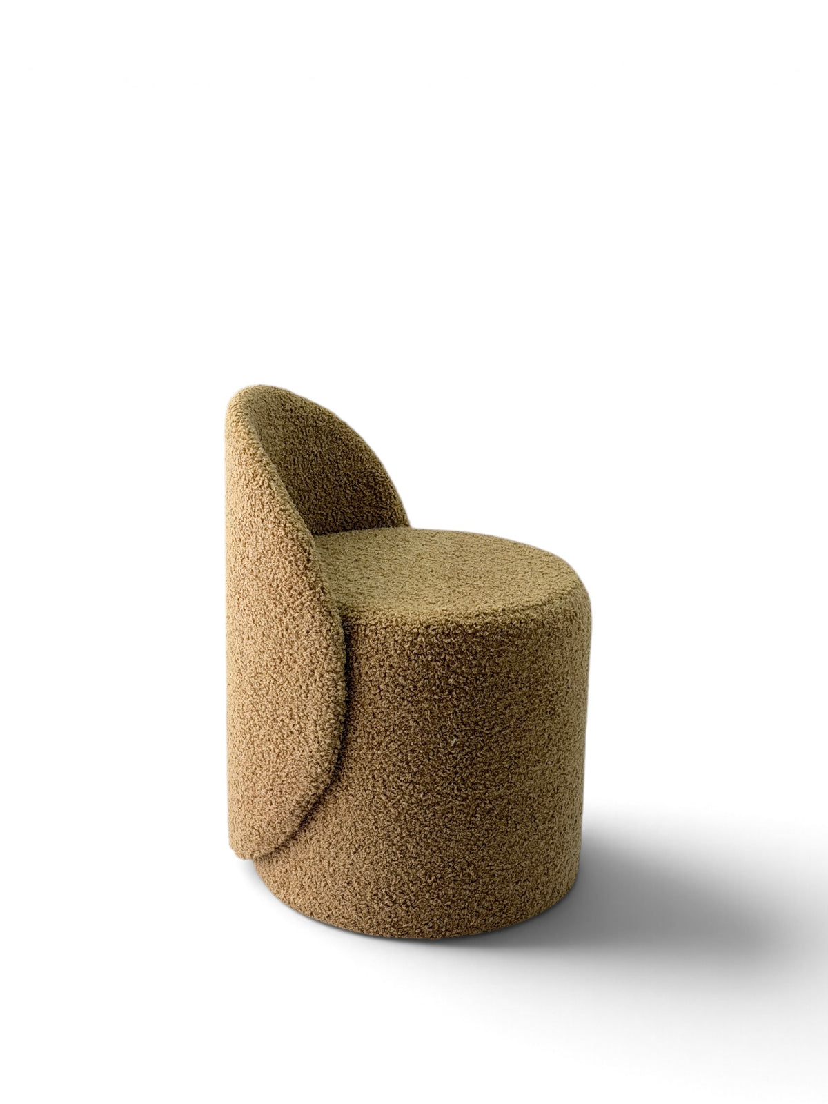 Prisma bouclé accent chair in camel on a white background