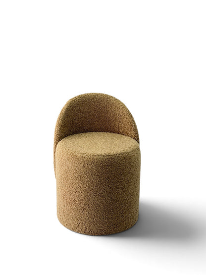 Prisma bouclé accent chair in camel on a white background