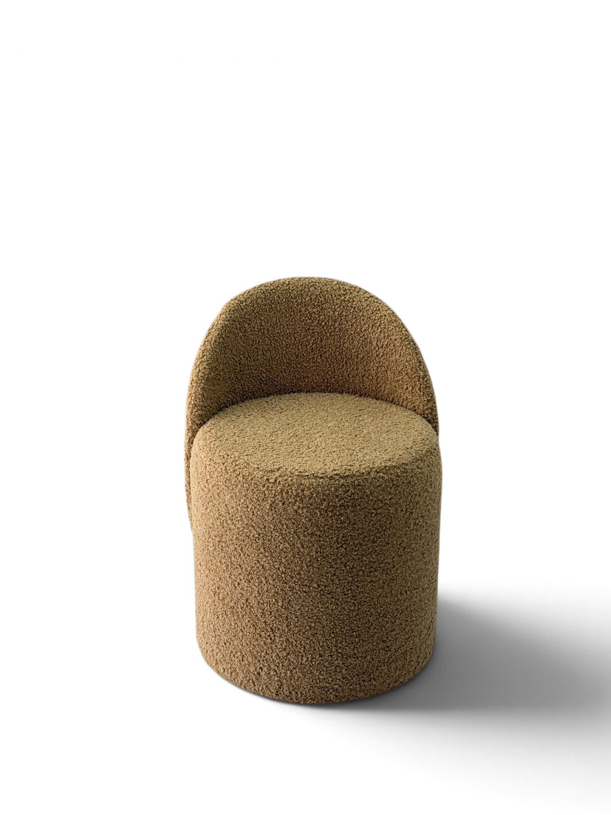 Prisma bouclé accent chair in camel on a white background