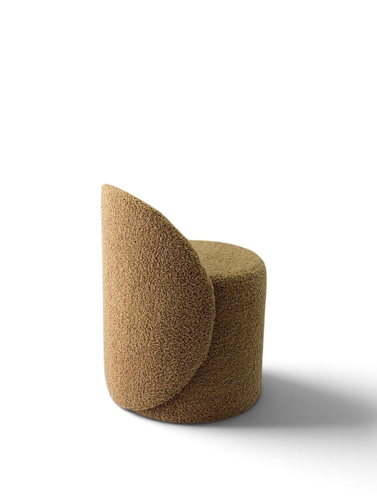 Prisma bouclé accent chair in camel on a white background