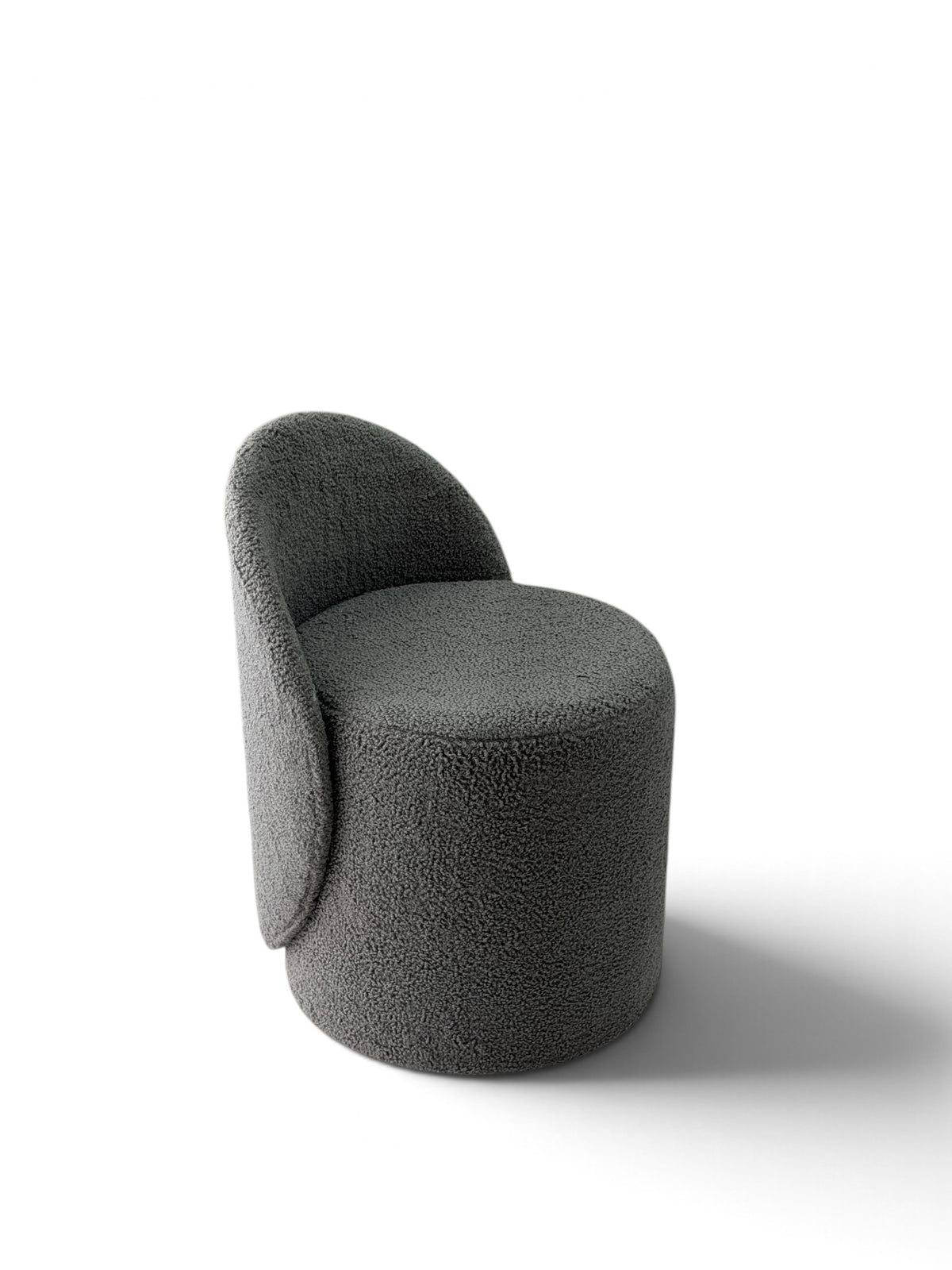 Prisma bouclé accent chair in grey on a white background