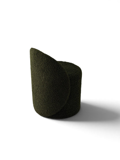 Prisma bouclé accent chair in olive on a white background