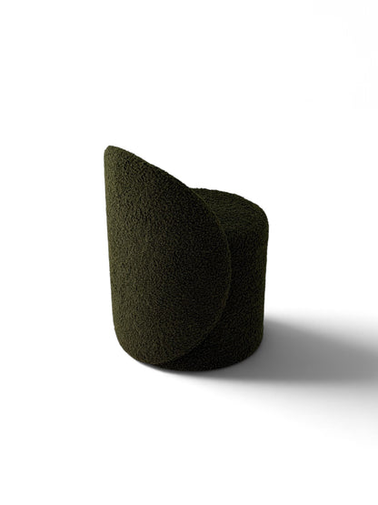 Prisma bouclé accent chair in olive on a white background