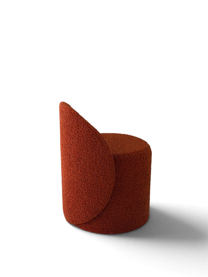 Prisma bouclé accent chair in terracotta on a white background